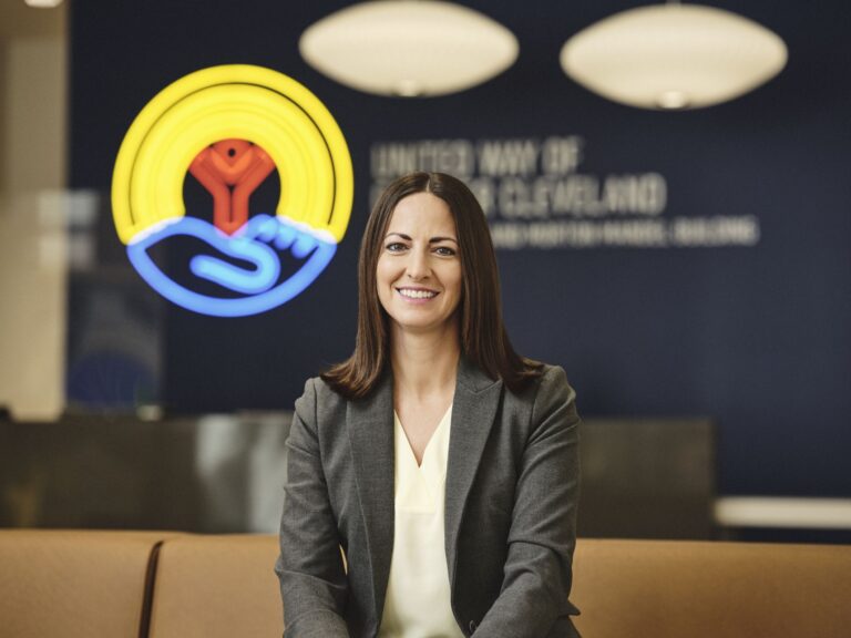 Kristen Popelmayer headshot in United Way lobby