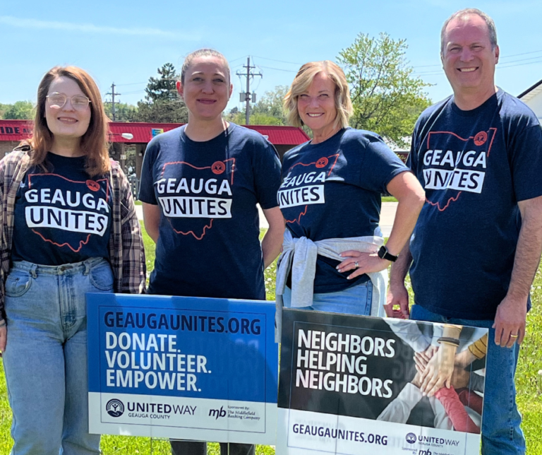 United Way Services of Geauga County staff wearing Geauga Unites t-shirt