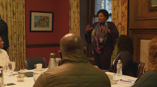 woman speaking at community working session