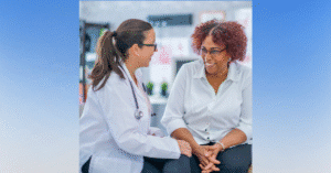 Doctor speaking to smiling patient